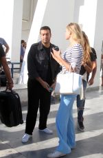 TONI GARRN Arrives at Airport in Mykonos 08/21/2015
