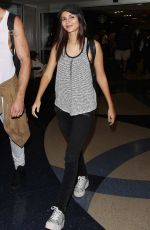 VICTORIA JUSTICE Arrives at LAX Airport in Los Angeles 08/29/2015