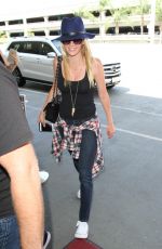 ALICE EVE Arrives at Los Angeles International Airport 09/03/2015