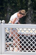 AMBER HEARD in Bikini Bottoms at a Pool in Rio De Janeiro 09/24/2015