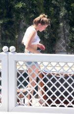 AMBER HEARD in Bikini Bottoms at a Pool in Rio De Janeiro 09/24/2015