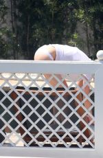 AMBER HEARD in Bikini Bottoms at a Pool in Rio De Janeiro 09/24/2015