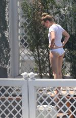 AMBER HEARD in Bikini Bottoms at a Pool in Rio De Janeiro 09/24/2015
