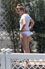 AMBER HEARD in Bikini Bottoms at a Pool in Rio De Janeiro 09/24/2015