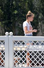 AMBER HEARD in Bikini Bottoms at a Pool in Rio De Janeiro 09/24/2015