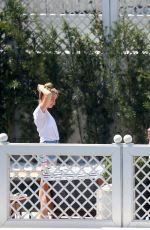 AMBER HEARD in Bikini Bottoms at a Pool in Rio De Janeiro 09/24/2015