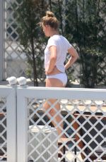 AMBER HEARD in Bikini Bottoms at a Pool in Rio De Janeiro 09/24/2015