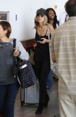 ANNALYNNE MCCORD Arrives at Los Angeles Itnernational Airport 09/17/2015