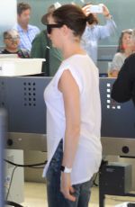 ANNE HATHAWAY Arrives at Los Angeles International Airport 09/17/2015