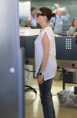 ANNE HATHAWAY Arrives at Los Angeles International Airport 09/17/2015