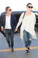 ANNE HATHAWAY Arrives at Los Angeles International Airport 09/17/2015