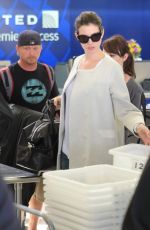 ANNE HATHAWAY Arrives at Los Angeles International Airport 09/17/2015