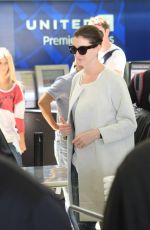 ANNE HATHAWAY Arrives at Los Angeles International Airport 09/17/2015