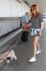 BELLA THORNE Arrives at Los Angeles International Airport 09/11/2015