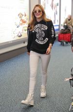 BELLA THORNE at Vancouver International Airport 09/29/2015