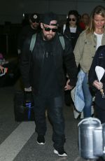 CAMERON DIAZ and Benji Madden at LAX Airport in Los Angeles