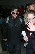 CAMERON DIAZ and Benji Madden at LAX Airport in Los Angeles