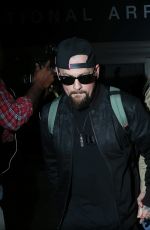 CAMERON DIAZ and Benji Madden at LAX Airport in Los Angeles