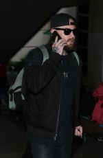 CAMERON DIAZ and Benji Madden at LAX Airport in Los Angeles