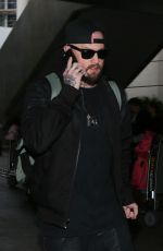CAMERON DIAZ and Benji Madden at LAX Airport in Los Angeles