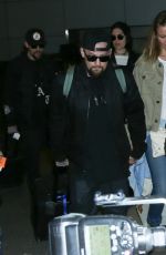 CAMERON DIAZ and Benji Madden at LAX Airport in Los Angeles