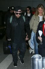 CAMERON DIAZ and Benji Madden at LAX Airport in Los Angeles