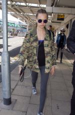 CARA DELEVINGNE Arrives at Heathrow Airport in London 09/20/2015
