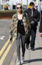 CARA DELEVINGNE Arrives at Heathrow Airport in London 09/20/2015