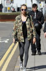 CARA DELEVINGNE Arrives at Heathrow Airport in London 09/20/2015