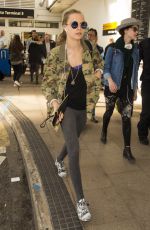 CARA DELEVINGNE Arrives at Heathrow Airport in London 09/20/2015