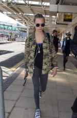 CARA DELEVINGNE Arrives at Heathrow Airport in London 09/20/2015