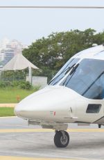 CARA DELEVINGNE at a Heliport in Rio De Janeiro 09/26/2015