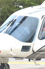 CARA DELEVINGNE at a Heliport in Rio De Janeiro 09/26/2015