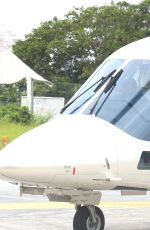 CARA DELEVINGNE at a Heliport in Rio De Janeiro 09/26/2015