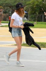 CARA DELEVINGNE at a Heliport in Rio De Janeiro 09/26/2015
