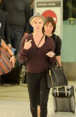 CHARLIZE THERON at LAX Airport in Los Angeles 09/29/2015