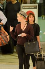 CHARLIZE THERON at LAX Airport in Los Angeles 09/29/2015