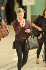 CHARLIZE THERON at LAX Airport in Los Angeles 09/29/2015