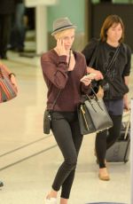 CHARLIZE THERON at LAX Airport in Los Angeles 09/29/2015