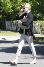 CHARLIZE THERON Leaves a Friend