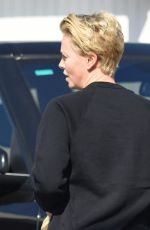 CHARLIZE THERON Out and About in Beverly Hills 09/23/2015