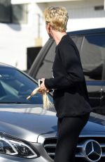 CHARLIZE THERON Out and About in Beverly Hills 09/23/2015