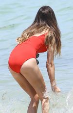 COURTNEY BIGHAM in Red Swimsuit at a Beach in Miami 09/02/2015
