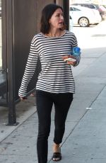 COURTNEY COX Out Shopping in West Hollywood 09/17/2015