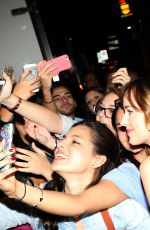 DAKOTA JOHNSON Arrives at amfAR Gala in Milan 09/26/2015