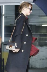 DAKOTA JOHNSON Arrives at Gucci Fashion Show in Milan 09/23/2015