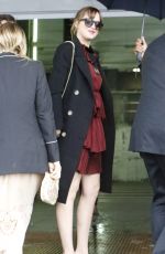 DAKOTA JOHNSON Arrives at Gucci Fashion Show in Milan 09/23/2015