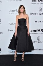 DAKOTA JOHNSON at amfAR Gala in Milan 09/26/2015