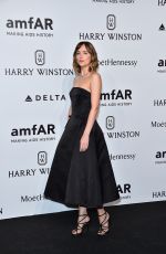 DAKOTA JOHNSON at amfAR Gala in Milan 09/26/2015