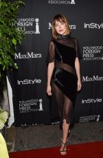 DAKOTA JOHNSON at Instyle & hfpa Party at 2015 TIFF 09/12/2015